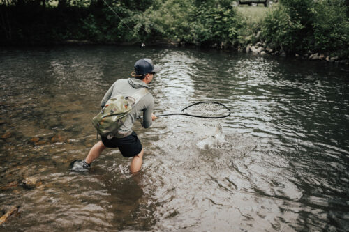 Fly Fishing Wade Trip Gift Certificate photo of fisherman in a stream