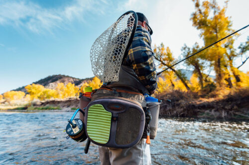 photo of a man casting his Cortland fly fishing line.