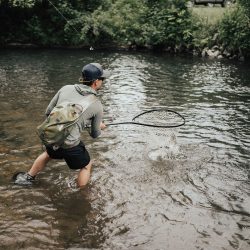 Fly Fishing Wade Trip Gift Certificate photo of fisherman in a stream